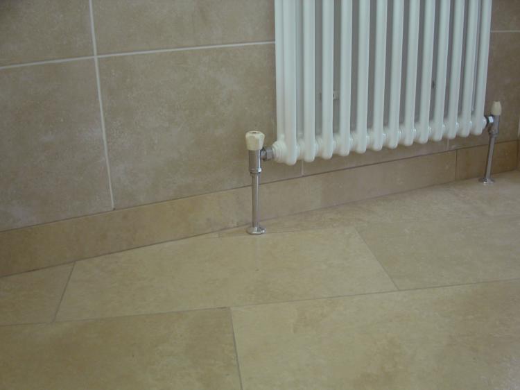Travertine tiles, en-suite shower and W.C