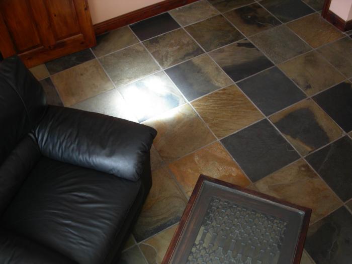 Living room floor set with Calico slate tiles